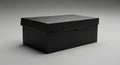 Black rectangular cardboard box with a lid, placed against a neutral gray background. The box has Royalty Free Stock Photo