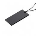 Black rectangular cardboard price tag on a black string, label for indicating the price of goods Royalty Free Stock Photo