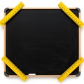 A black rectangular chalkboard with a wooden frame is shown. Positioned on each Royalty Free Stock Photo