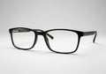 Black rectangular eyeglasses with a sleek, polished frame. The lenses Royalty Free Stock Photo