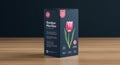 Black rectangular packaging box on a wooden table. Features a pink tulip illustration Royalty Free Stock Photo