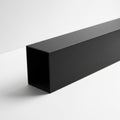 Black Rectangular Prism Object on White Surface with Shadow Royalty Free Stock Photo