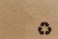 Black recycle symbol on cardboard background Royalty Free Stock Photo