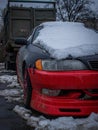 black and red car under the snow Royalty Free Stock Photo