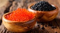 Black and red caviar in wooden bowl on old wooden table Royalty Free Stock Photo