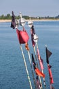 Black and red flags of fishing nets