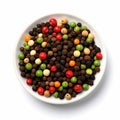 Black, red, green, white and allspice peppercorns isolated on white background Royalty Free Stock Photo