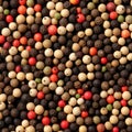 Black, red, green, white and allspice peppercorns Royalty Free Stock Photo