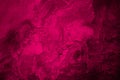 Black red rough surface. Toned old concrete wall. Viva magenta color. Trend 2023. Close-up. Grunge background. Royalty Free Stock Photo