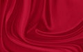 Black red satin dark fabric texture luxurious shiny that is abstract silk cloth background with patterns. Royalty Free Stock Photo