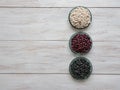 Black, red and white beans flat lay on a table. Royalty Free Stock Photo