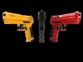 Black, red and yellow modern handguns