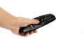 Black remote control in hand isolated on white background Royalty Free Stock Photo