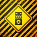 Black Remote control icon isolated on yellow background. Warning sign. Vector Illustration