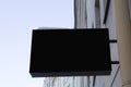 Black restangular signboard on the wall. Mock up Royalty Free Stock Photo