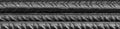 black ribbed steel reinforcing bars background Royalty Free Stock Photo