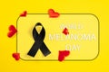 Black ribbon-symbol of fight against melanoma and skin cancer. Royalty Free Stock Photo