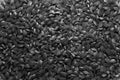 Black rice background texture, dark wild long grain natural rice, jasmine rice closeup Royalty Free Stock Photo