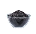 Black rice in a clear glass bowl isolated on white background.black rice heap in glass bowl Royalty Free Stock Photo