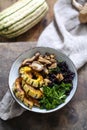 Black rice with roasted delicata squash, massaged kale and shiitake mushrooms Royalty Free Stock Photo