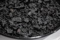 Black rice with seafood spanish paella on a black pan Royalty Free Stock Photo