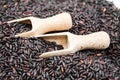 Black rice texture and spoons Royalty Free Stock Photo