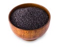 Black rice in wooden bowl isolated on white background Royalty Free Stock Photo
