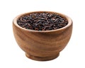 Black rice in wooden bowl isolated on white background Royalty Free Stock Photo