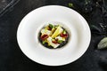 Black Risotto with Octopus and Sun Dried Tomatoes Royalty Free Stock Photo