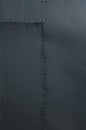 Black Riveted Sheet Metal Background