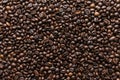 Black roasted coffee beans texture top view