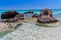 Black rocks and turquoise water, island of Crete Royalty Free Stock Photo