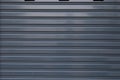 Black roller shutter door closed security background