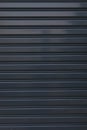 Black roller shutter door closed security background