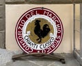 Black Rooster symbol on a Chianti Classico sign outside a restaurant in Castellina in Chianti