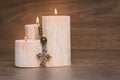 Black rosary on the Candle