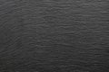 Black rough slate board texture background.