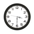 Black round analog wall clock isolated on white background. Royalty Free Stock Photo