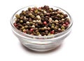 black round pepper spice in glass bowl on white background