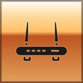 Black Router and wi-fi signal icon isolated on gold background. Wireless ethernet modem router. Computer technology