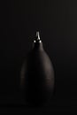Black Rubber Air Blower for Camera Cleaning on Dark Background Royalty Free Stock Photo