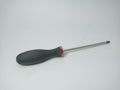 Black Rubber handled Philips or cross screwdriver on white background