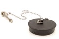 Black rubber sink stopper with chain and chrome Royalty Free Stock Photo