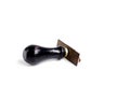 Black rubber wooden stamp placed on white background Royalty Free Stock Photo
