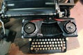 Black rusty typewriter used by typists than once Royalty Free Stock Photo