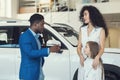 Black salesman asks woman daughter opinion about new car