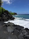 Black sand beach in hawaii Royalty Free Stock Photo