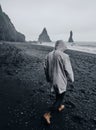 Black sand beach in Iceland. Man on blacksand Royalty Free Stock Photo