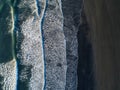 The black sand beach in Iceland. Sea aerial view and top view. A Royalty Free Stock Photo