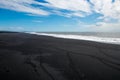 Black sand beach, Reynisfjara shore near the village Vik, atlantic ocean, Iceland Royalty Free Stock Photo